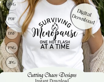 May include: White t-shirt with the text "SURVIVING Menopause ONE HOT FLASH AT A TIME" in black script. The shirt also has a flame graphic. The image includes digital download options for SVG, PDF, DXF, PNG, and JPG files.