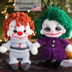 May include: Two handmade crochet dolls featuring plush yarn textures. One doll has orange hair, a white face, red nose, and gray outfit. The other has green hair, a white face, and a purple coat with green buttons. Text reads: PDF CROCHET PATTERN.
