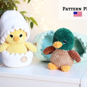 May include: A crocheted yellow chick peeking out of a white egg-shaped shell, and a crocheted brown and green duckling sitting in a light blue and green egg-shaped shell.  PATTERN PDF.