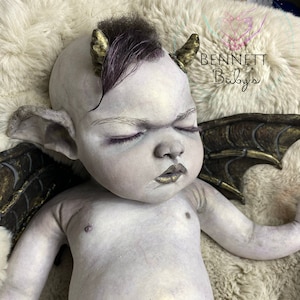 Custom painted  painted full body fantasy  silicone baby River with wings  closed eyes in super soft platinum silicone blenld