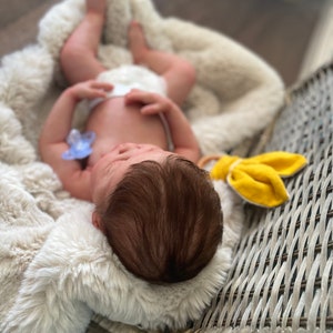 Custom painted full body silicone baby Indigo  closed eyes in super soft platinum silicone blend
