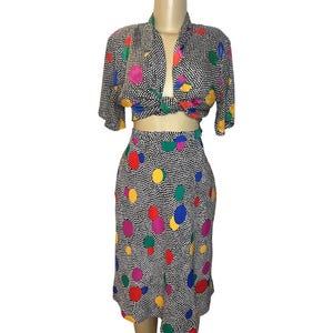 Blusa vintage de lunares Gianna de los años 80 y falda de lunares AC Sport.