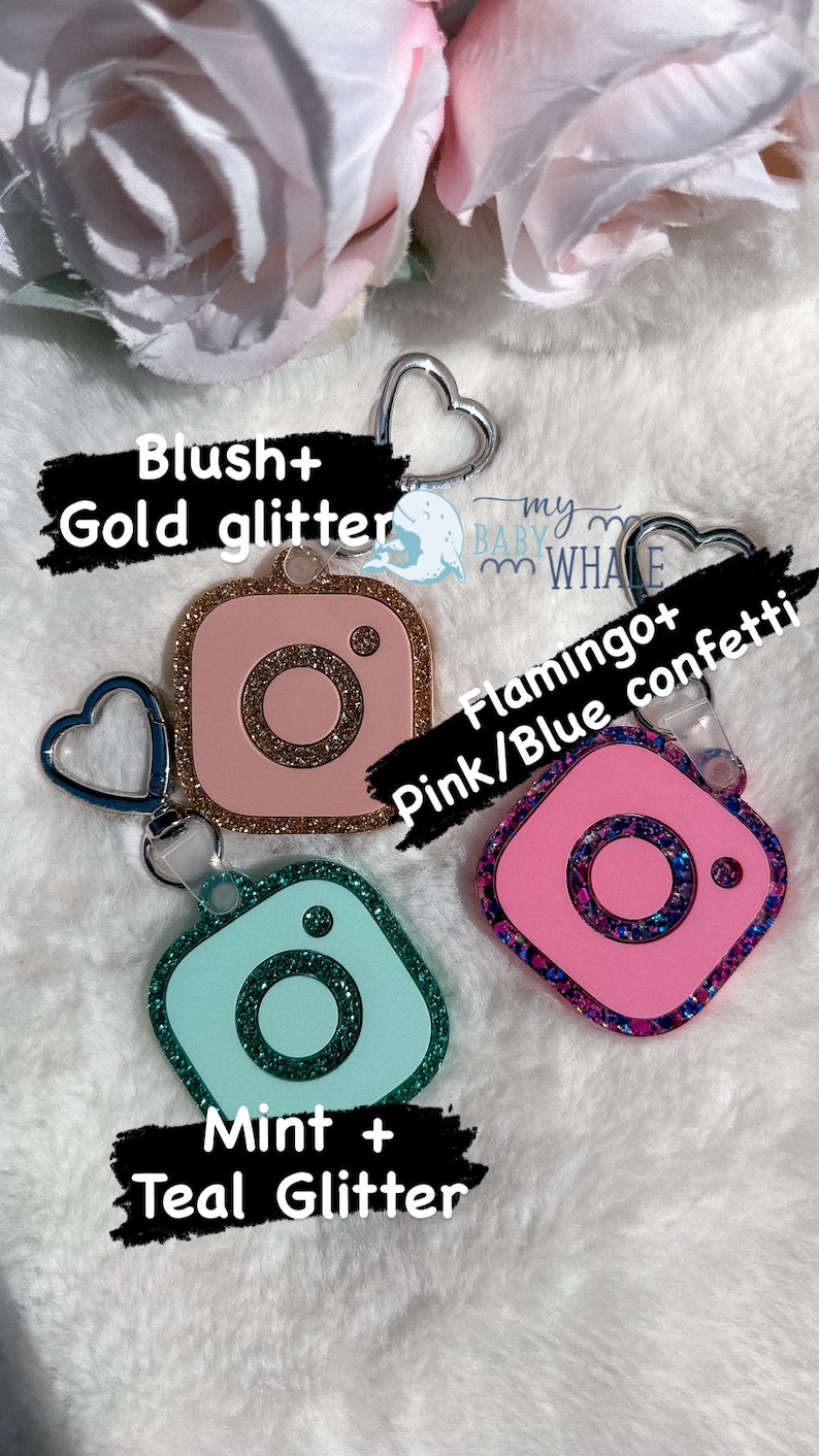 May include: Three Instagram-themed keychains with different glitter colors and designs. The first keychain is pink with gold glitter and says "Blush + Gold glitter". The second keychain is pink with pink and blue glitter and says "Flamingo + Pink/Blue confetti". The third keychain is mint green with teal glitter and says "Mint + Teal Glitter".