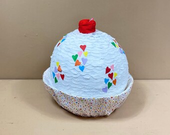 Cupcake piñata, a sweet addition to your Cupcake party decorations, and a great party game to add fun to your Birthday Party or Baby shower