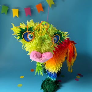 Colourful curious creature piñata