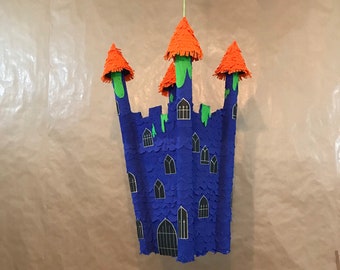 Halloween piñata, a perfect party game for a Halloween party, a spooky, slimy  haunted castle to compliment your Halloween décor perfectly