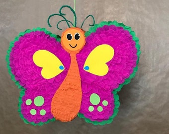 Butterfly Piñata, a beautiful bright party game to enjoy at your birthday party that will  compliment your butterfly party décor perfectly