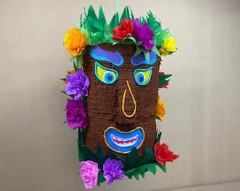 Tiki Piñata, a great addition to your Hawaiian Birthday Party Décor, and is a super fun party game for cocktail parties and Hawaiian Luaus