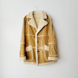 1970s Long Tan Paneled Suede and Shearling Afghan Coat. Heavy Duty Warm Sherpa Coat. Boho Hippie Textured Leather Jacket. Llama Wool Coat