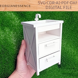 May include: White wooden cabinet with three drawers and a sink on top. The cabinet has a decorative X-shaped design on the front.  SVG CDR AI PDF DXF DIGITAL FILE.