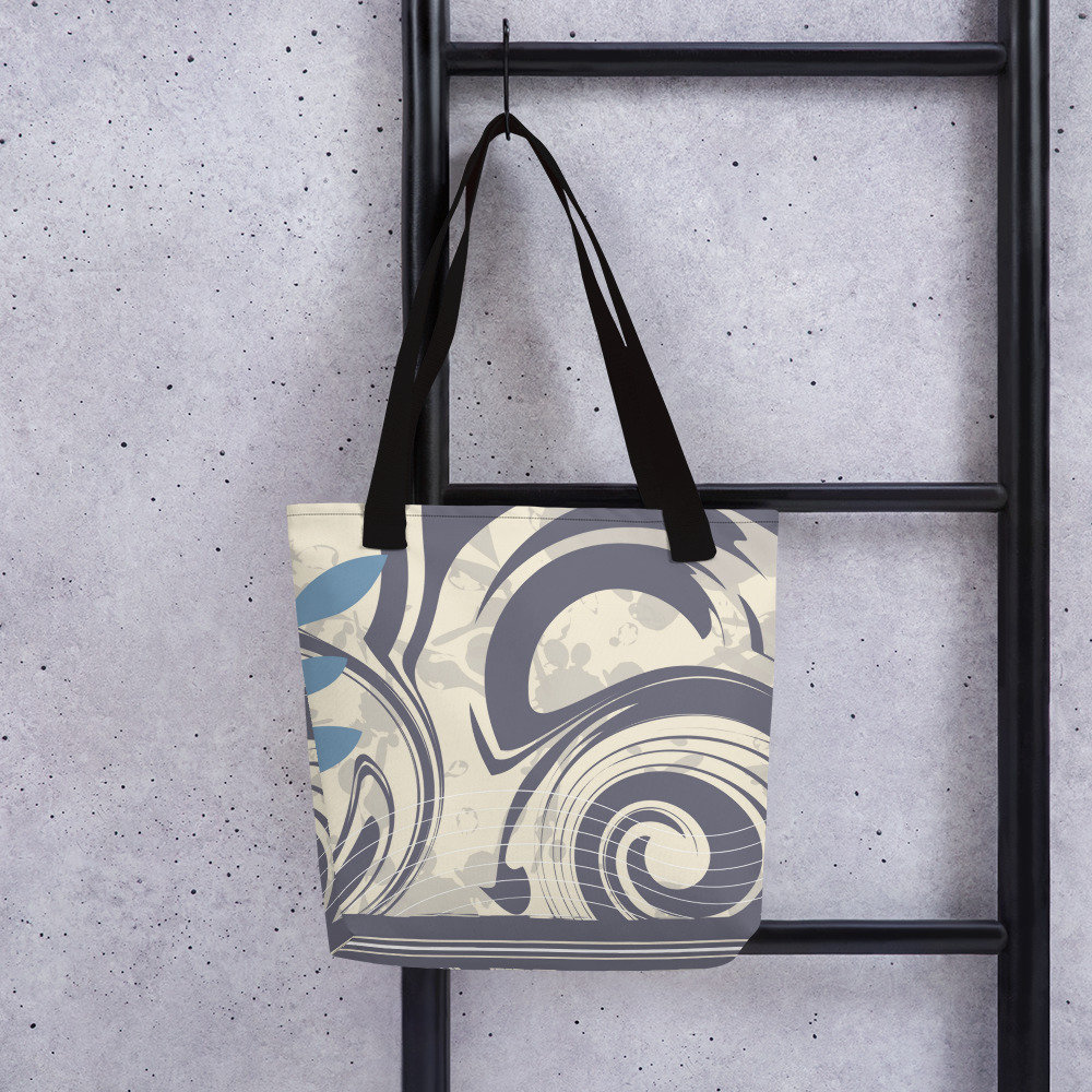 May include: A tote bag with black straps and a cream and grey abstract swirl design. The design features blue accents.