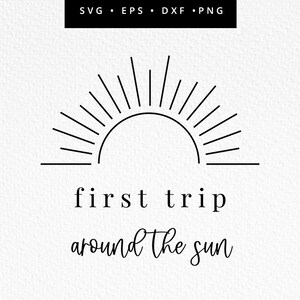 May include: A black and white graphic of a sun with the text "first trip around the sun" below it.