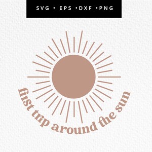May include: A brown sun with rays radiating out, with the text "first trip around the sun" in a curved arc around the sun.