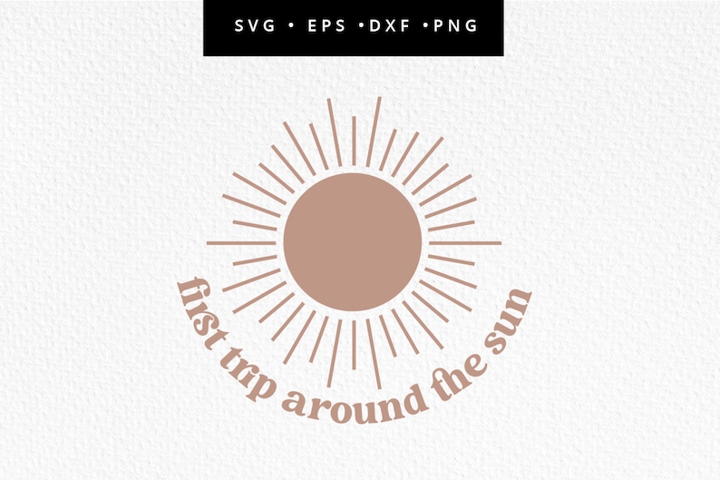 May include: A brown sun with rays radiating out, with the text "first trip around the sun" in a curved arc around the sun.