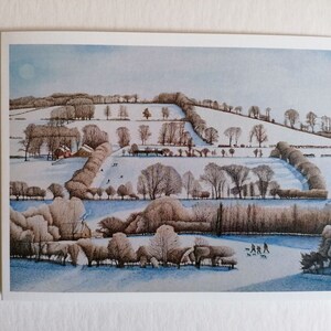 May include: A snowy winter landscape with a small village in the distance. The scene is painted in muted tones of brown, white, and blue, with a hint of red from the roof of a building. The trees are bare and the ground is covered in snow. There are several figures walking in the distance.