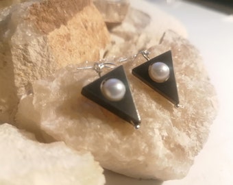 Hematite and genuine, white, freshwater pearl earings in sterling silver.