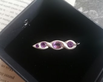 Amethyst and solid sterling silver twist pendant