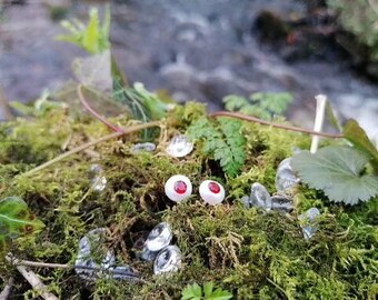 Garnet and natural fresh-water pearl, stud earings in sterling silver.
