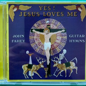 May include: CD case with a purple cover featuring the text "YES! JESUS LOVES ME" and "JOHN FAHEY GUITAR HYMNS." The artwork depicts Jesus on the cross, angels, deer, and a skeleton. The CD is in a clear plastic case.