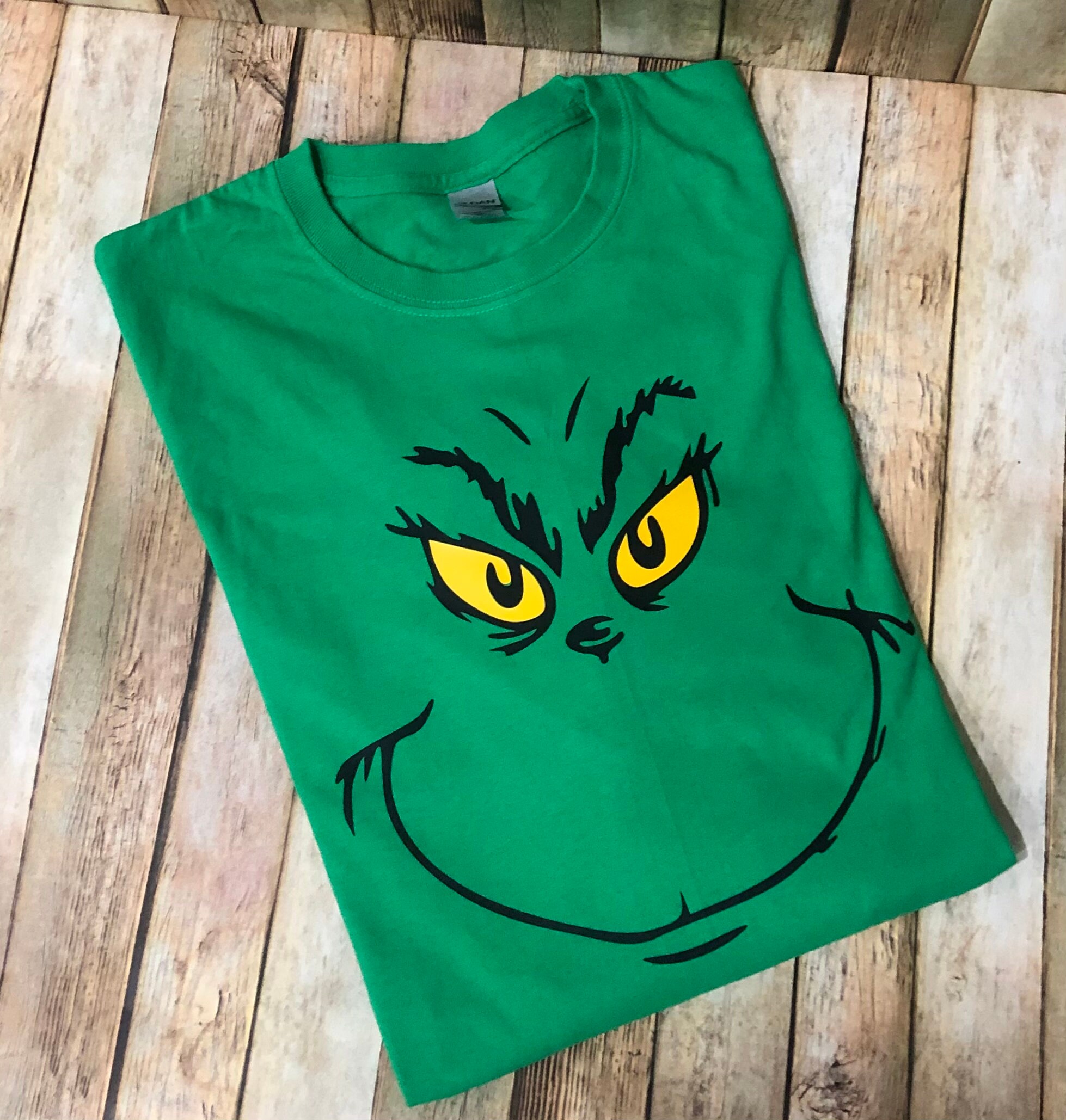 grinch themed shirt