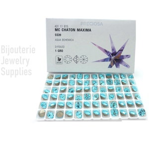 May include: A box of Preciosa MC Chaton Maxima SS39 rhinestones in Aqua Bohemica color. The rhinestones are D-foiled and come in a 1 gross package.