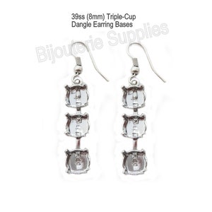 May include: A pair of silver triple-cup dangle earring bases, each with three cup settings for 8mm stones. The earring bases are 39ss and have a hook closure.