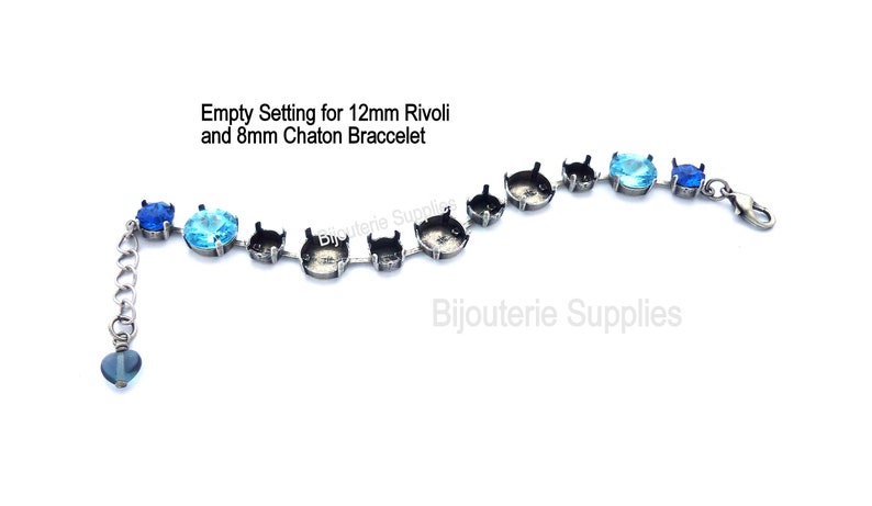 May include: Empty setting for 12mm Rivoli and 8mm Chaton bracelet. The bracelet is made of silver tone metal and has a clasp closure. The bracelet is shown with blue and light blue rhinestones.