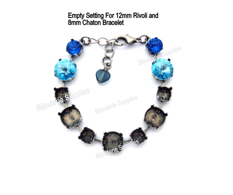 May include: Empty setting for a bracelet with silver-toned metal settings and a chain. The settings are designed to hold 12mm Rivoli and 8mm Chaton stones. The bracelet has a heart-shaped charm.