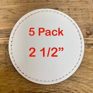 May include: White round coaster with a stitched edge. The coaster has red text that says "5 Pack 2 1/2""