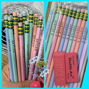 May include: Pastel-colored pencils with the name "Skyler" printed on them, alongside a set of pencils labeled "Justice S." and pink erasers. The pencils have pink, blue, green, and orange barrels with yellow and green accents.