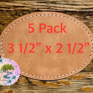 May include: Five pack of brown leather oval patches, each measuring 3 1/2 inches by 2 1/2 inches. The patches have a white stitched edge.