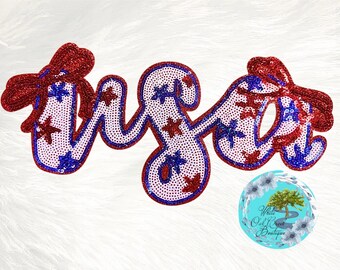 May include: A sequined "USA" design in red, white, and blue. The letters are outlined in blue and filled with white sequins, adorned with red and blue star-shaped sequins. Red sequined bows accent the letters. The design is on a white background.