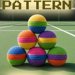 May include: A stack of six colorful crochet balls, each with horizontal stripes in various colors like blue, orange, pink, yellow, green, and purple. The image has the text "CROCHET PATTERN", "Amigurumi", and "PDF". The balls are on a green surface.