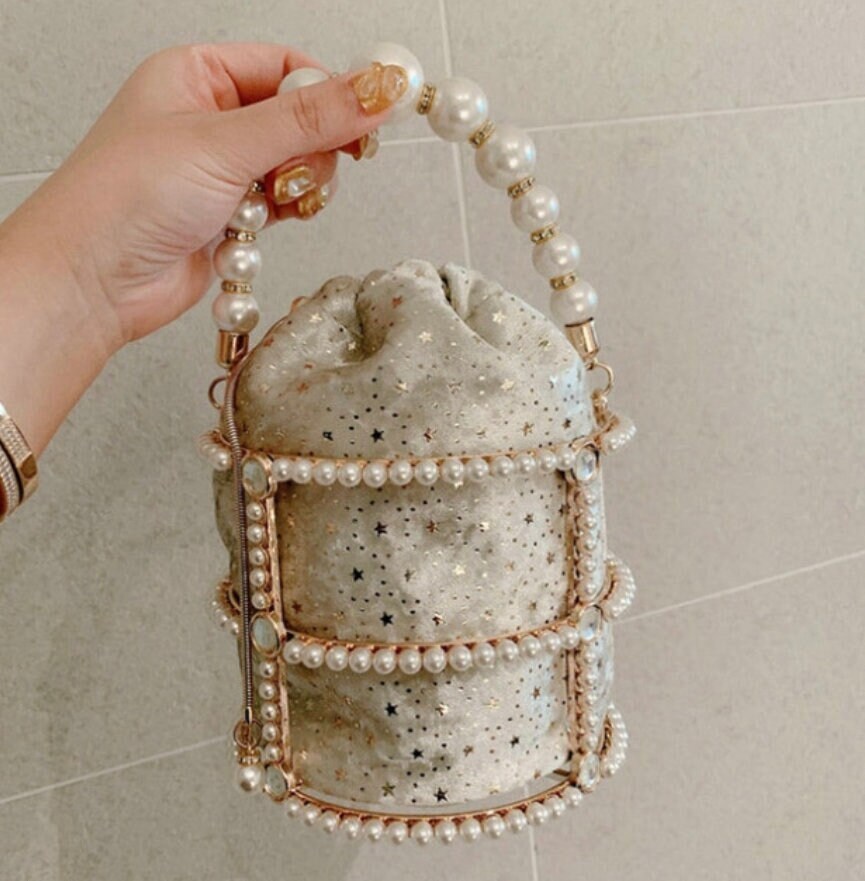 Pearl cage bag sales