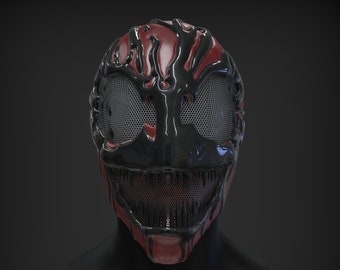 May include: A black and red plastic mask with a menacing grin and a mesh covering the eyes. The mask is designed to resemble a creature with sharp teeth and a dripping, viscous substance.