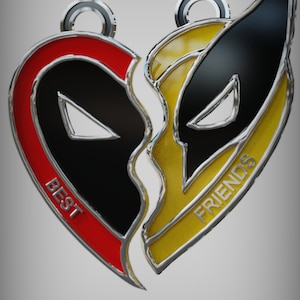 May include: Two halves of a heart-shaped pendant, one red and black with the word "BEST" and the other yellow and black with the word "FRIENDS".