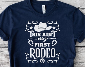 Rodeo T-Shirt, Not My First Rodeo Shirt, Funny Cowgirl T Shirt, Texas Rodeo Tshirts, Rodeo Birthday Gift, This Ain't My First Rodeo Tshirt