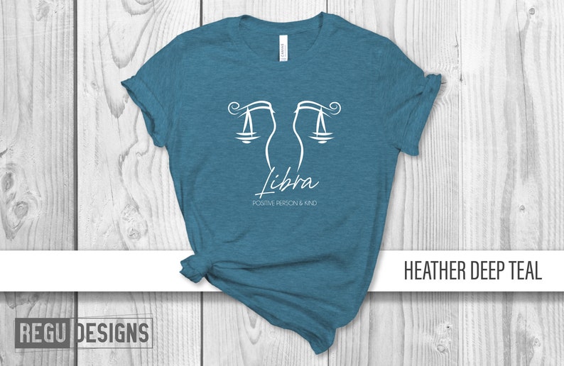 May include: Teal heather t-shirt with a white Libra zodiac symbol and the text "Positive Person & Kind".