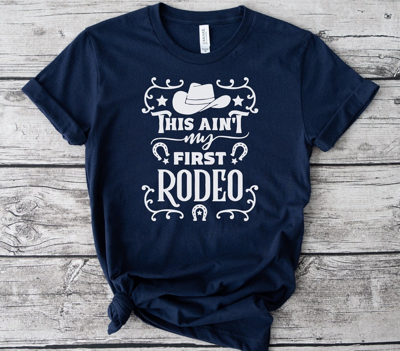 Rodeo T-Shirt, Not My First Rodeo Shirt, Funny Cowgirl T Shirt, Texas Rodeo Tshirts, Rodeo Birthday Gift, This Ain't My First Rodeo Tshirt