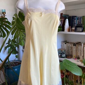 Vintage 50s pale yellow romper/teddie with ivory lace trim by SEARS