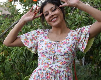Raro vestido largo vintage de los años 60/70 con novedoso estampado floral