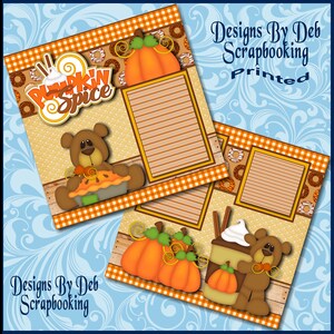 May include: Two scrapbook pages with a fall theme. One page has a bear holding a pie, a pumpkin, and the words "Pumpkin Spice". The other page has a bear with a drink and pumpkins. The pages have a wood and gingham border.