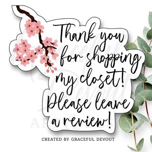 May include: A white sticker with black script that reads "Thank you for shopping my closet! Please leave a review!" A branch of pink cherry blossoms is on the left. The text "CREATED BY GRACEFUL DEVOUT" is at the bottom.