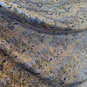 iridescent Hologram gold with silver glitter and black  design spandex stretch for all 4 sides 58/60 wide sold by the yard