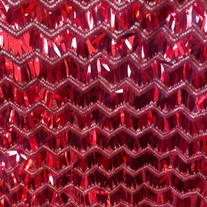 sequins of swords red with gold 2 way stretch  Mesh Fabric Sold by the yard