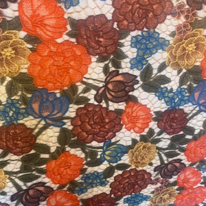 Multi color flowers and roses 4 w stretch Fabrics sold by the yard with gold and floral details