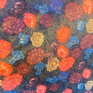 Multi color flowers and roses stretches to all 4 sides sold by the yard