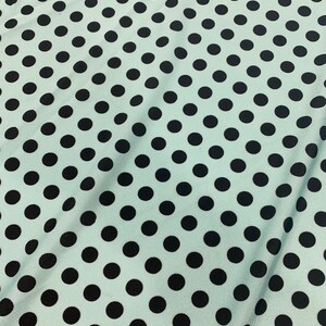 New naylo espandex polka dots mint /black 4 way Stretch sold by the yard