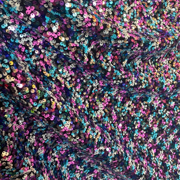 Tissu noir à mailles extensibles multicolores Wave Designs, paillettes vendu par mètre