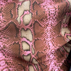 snake spandex pink 60 wide stretches 4 sides sold by the yard